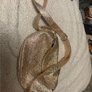 Gold Crossbody Bag with Structured Design and Metallic Accents